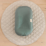 Multifunctional baby lounger designed for relaxation, tummy time, and hands-free moments, with a plush Tencel® mesh fabric and 3D mesh technology.