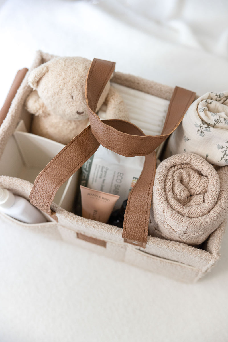 linen label caddy in dark dude colour. showing detail of all functioning pockets