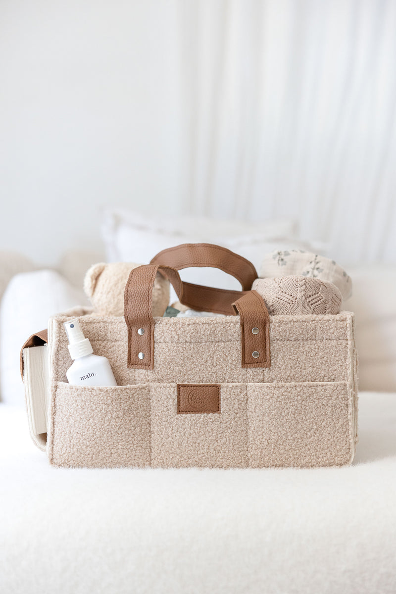 linen label caddy in dark dude colour. showing detail of all functioning pockets