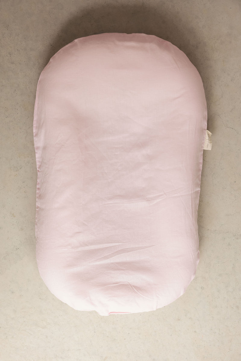 Linen Label baby lounger featuring the baby pink pure linen flax cover