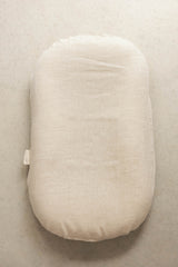 Linen Label baby lounger featuring the baby pink pure linen flax cover