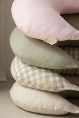 Linen Labels new moon shape pillows, featuring all four colours, Baby Pink, Sage green, Gingham, Natural oat beige. 