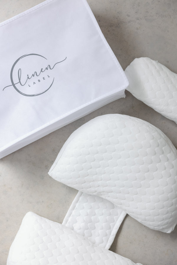 pregnancy Pillow compact by linen label. showing the easy-adjustment system and compact design with 3 attachments and easy storage cover Velcro atta